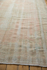 Vintage Distressed Oushak carpet pile showing mostly even wear, pale rose, and beige tones.