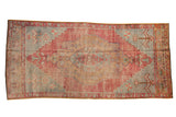 Vintage Distressed Oushak runner, faded red, gold, and slate blue medallion, 2'10