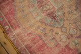 Distressed Oushak rug runner's yellow side cord selvage with visible faded red and gold pile.