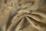 Distressed texture and abrash of a vintage Oushak runner in natural earth tones.
