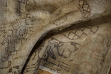 Close-up of the hand-knotted vintage Oushak rug's distressed texture and soft abrashes.