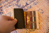 Black rubber backing and cream fringe on a Chief Joseph pattern CoasterRug.