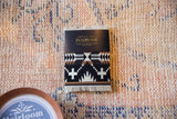 Pendleton Spider Rock Coaster, black, white, brown geometric pattern, with fringe.