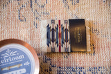 Wyeth Trail Pendleton CoasterRugs stack featuring vibrant geometric pattern and fringe.