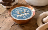 Copper Kettle Soy Candle with a blue 'Linen' label and two prominent wicks.