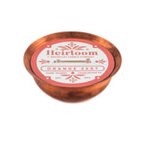 Heirloom Copper Kettle Soy Candle featuring an orange zest label and dual wicks.