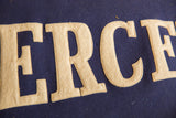 Textural detail of hand-stitched cream 