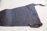 Reverse side of the antique Highland pennant showing yellow hand-stitching and felt ties.