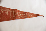 Rust-red vintage Havana Cuba felt pennant with cream 'HAVANA CUBA' text.