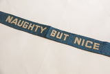 Vintage blue felt banner displaying the phrase 
