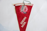 Upper section of vintage red felt flag showing Native American headdress and green hanging loop.