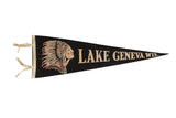 Vintage Lake Geneva Wisconsin black felt flag with Native American headdress graphic, 8x26 inches.