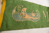 Green felt flag's yellow edge and graphic of Native American in canoe.