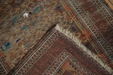 Antique Belouch rug detail: hard wear, exposed foundation, scattered repairs, and reverse.