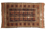 Antique Belouch rug with columned stylized germinating plants, madder red, navy, and earth tones. 3'1