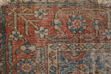 Antique Malayer rug corner: worn madder root Herati field, meandering border, exposed foundation.