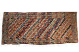 Collector's antique Kurdish runner with diagonal ribbon stripes in rust, sapphire blue, and saffron.