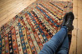 Antique Kurdish runner with randomly alternating colored diagonal ribbons bearing inline botehs.