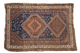 Antique Persian Afshar rug, indigo blue, chestnut, ivory tones, double diamond medallions and tribal motifs.
