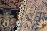 Textured hand-knotted fringe with expressive floral patterns in navy, rust, and beige Lilihan.