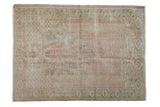 Vintage distressed Oushak square rug, faded blush, green, brown prayer design with lattice motifs.