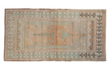 Distressed vintage Oushak runner, faded tree of life design in sand and ocean blue.