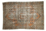 Vintage distressed Oushak rug, geometric medallion in pale orange, slate blue, and beige. 3'10