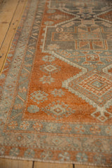 Vintage distressed Oushak rug runner, copper and silver tones, geometric floral and vine border details.