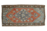 Distressed vintage Oushak rug mat with faded rust, dusty blue, and pale bronze medallion design. 1'7