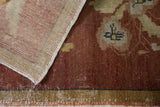 Detail of the distressed copper pile, visible foundation, and hand-knotted reverse of a vintage Oushak rug.