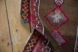 Textured pile and bright geometric border of a Vintage Distressed Oushak rug.