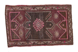 Vintage distressed Oushak mat with purple, fuchsia, and ivory geometric design, 1'11