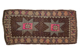 Distressed vintage Oushak rug mat with chocolate brown starburst medallion and pink accents, 1'9