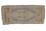 Vintage Distressed Oushak rug mat with faded lilac medallion and beige field, 1'5