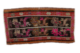 Distressed Oushak rug mat, charcoal with vibrant pink, tangerine stylized figures.
