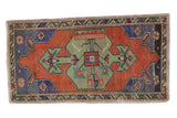 Distressed vintage Oushak rug with stylized tree of life, terracotta, royal blue, and pale green, 1'11
