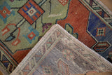 Distressed vintage Oushak rug pile revealing worn texture, foundation, and original selvage.