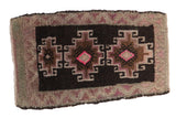 Distressed vintage Kars rug with triple hooked medallions and vibrant pink accents on chocolate brown.