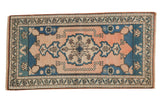 Distressed Oushak runner with pale blush field, blue medallion, floral border, 1'11