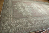 Decorative borders of Vintage Distressed Oushak rug with pawn and serrated leaf motifs.