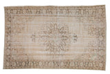 Vintage Distressed Oushak carpet with starburst medallion, faded ivory and muted rose tones, 6'7