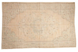 Distressed vintage Oushak carpet, faded beige and muted green floral medallion, 6'2
