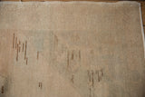 The hand-knotted foundation on the reverse of a vintage Oushak rug runner.