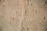Close-up of the hand-knotted pile, showing mostly even wear to the knot heads on the distressed Oushak rug.