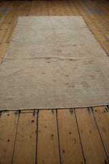 Reverse side of the vintage Oushak runner highlighting the hand-knotted rug foundation.