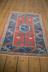 Even wear across knot heads on a distressed vintage Melas rug.