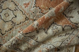 Vintage distressed Oushak rug pile showcasing even wear and time-softened burnt orange.