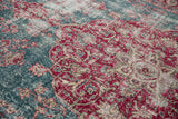 Angled view of the distressed Sivas carpet showing even wear to the knot heads.