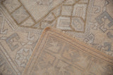 Vintage Melas rug corner showing hand-knotted pile, woven foundation, and intact selvage.