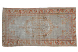 Distressed vintage Oushak rug, floral medallion in muted silver, rust, and beige, 2'11